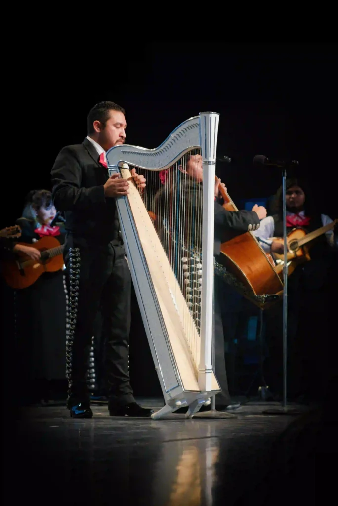 La Bienvenida 2024 A photo of a performer playing a stringed instrument, taken at Fresno State's La Bienvenida event in 2024